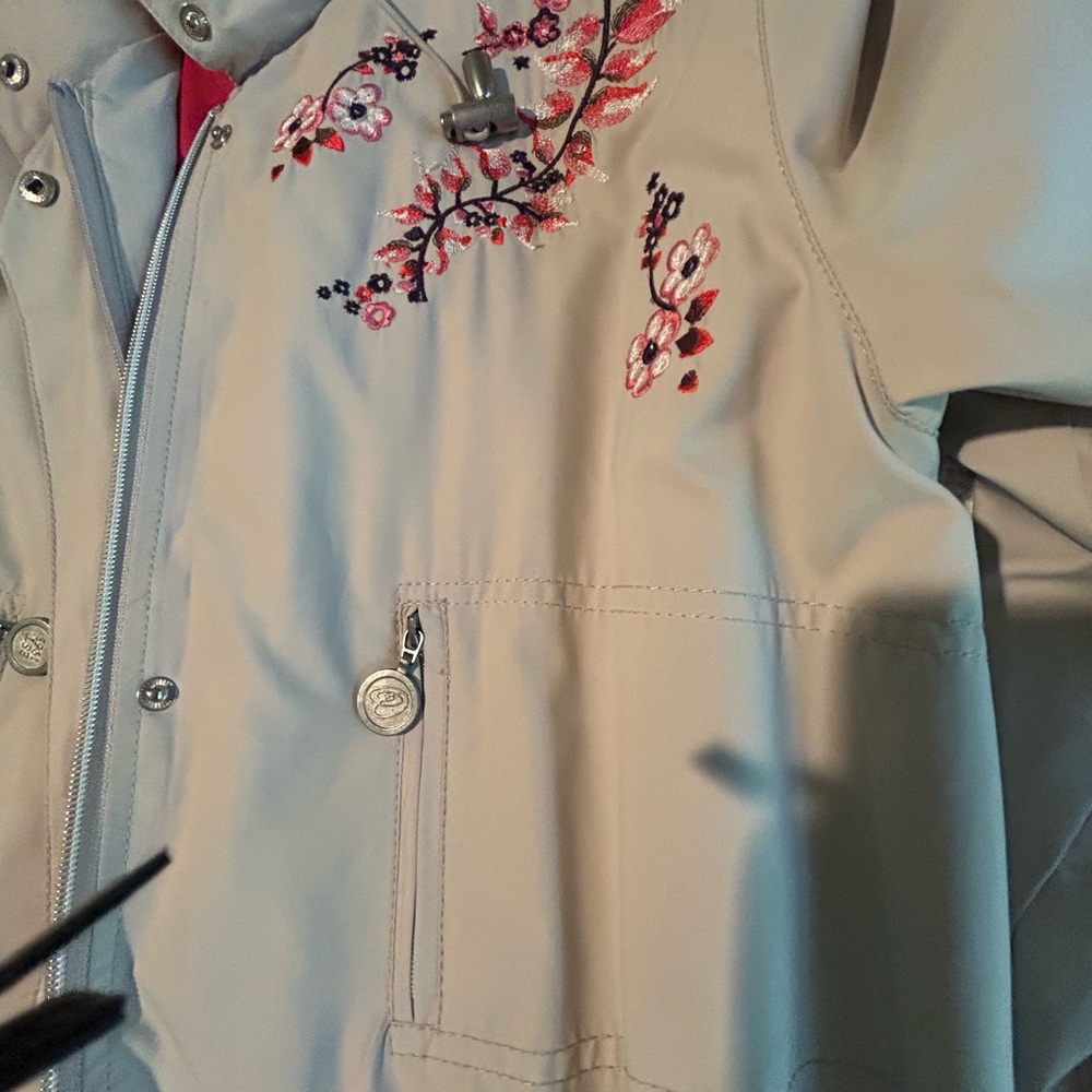 Asian inspired rain coat. Floral embroidery front, back, sleeve.NWOT. Size 40.